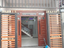 Bán nhà 1 trệt 1 lầu KDC Hoá An cổng sau công ty Pouchen, đường 6m thông
